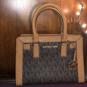 Micheal Kors mini monogram Saffiano handbag.